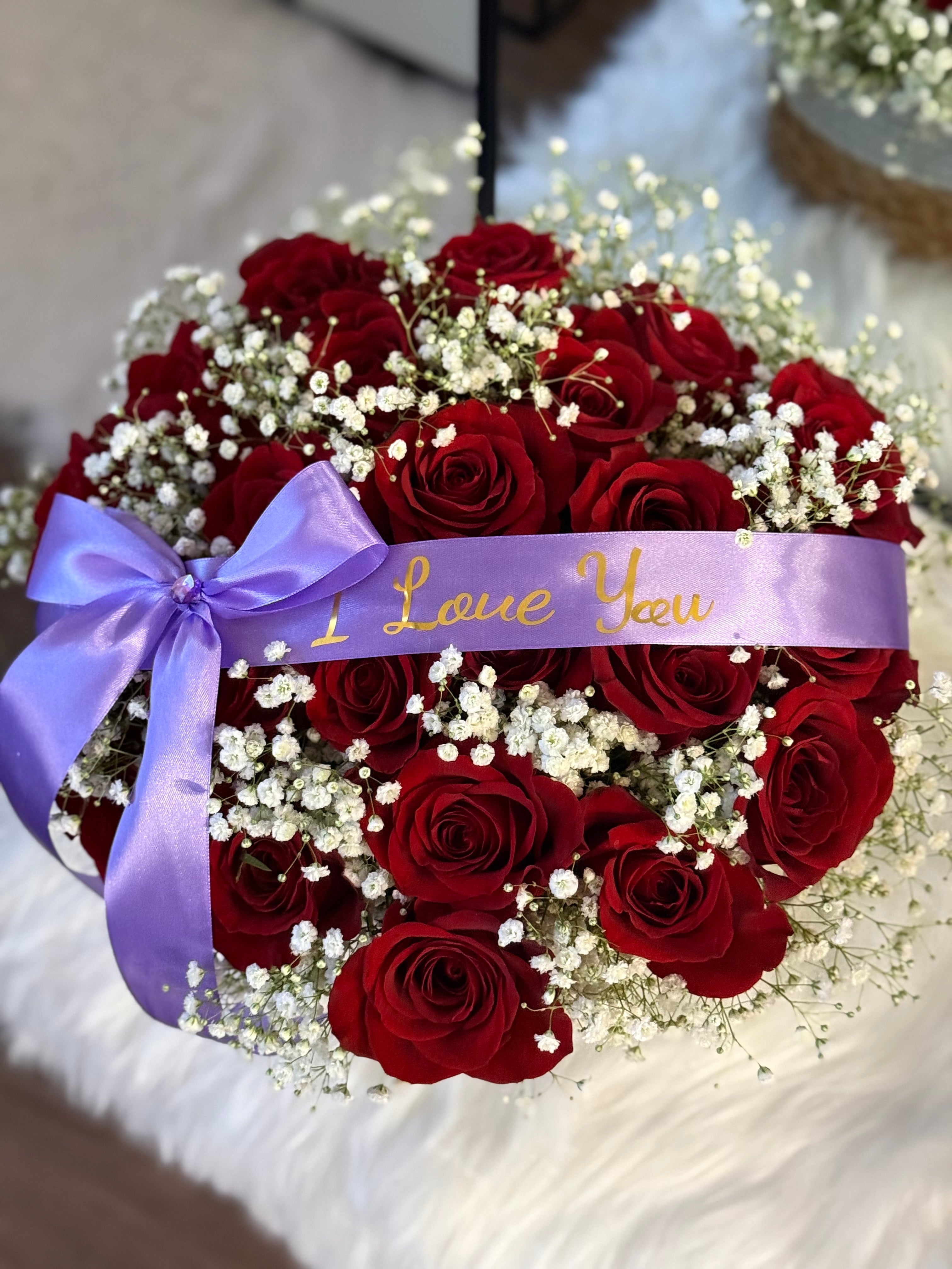 24 Red Roses With baby’s breath in a Basket
