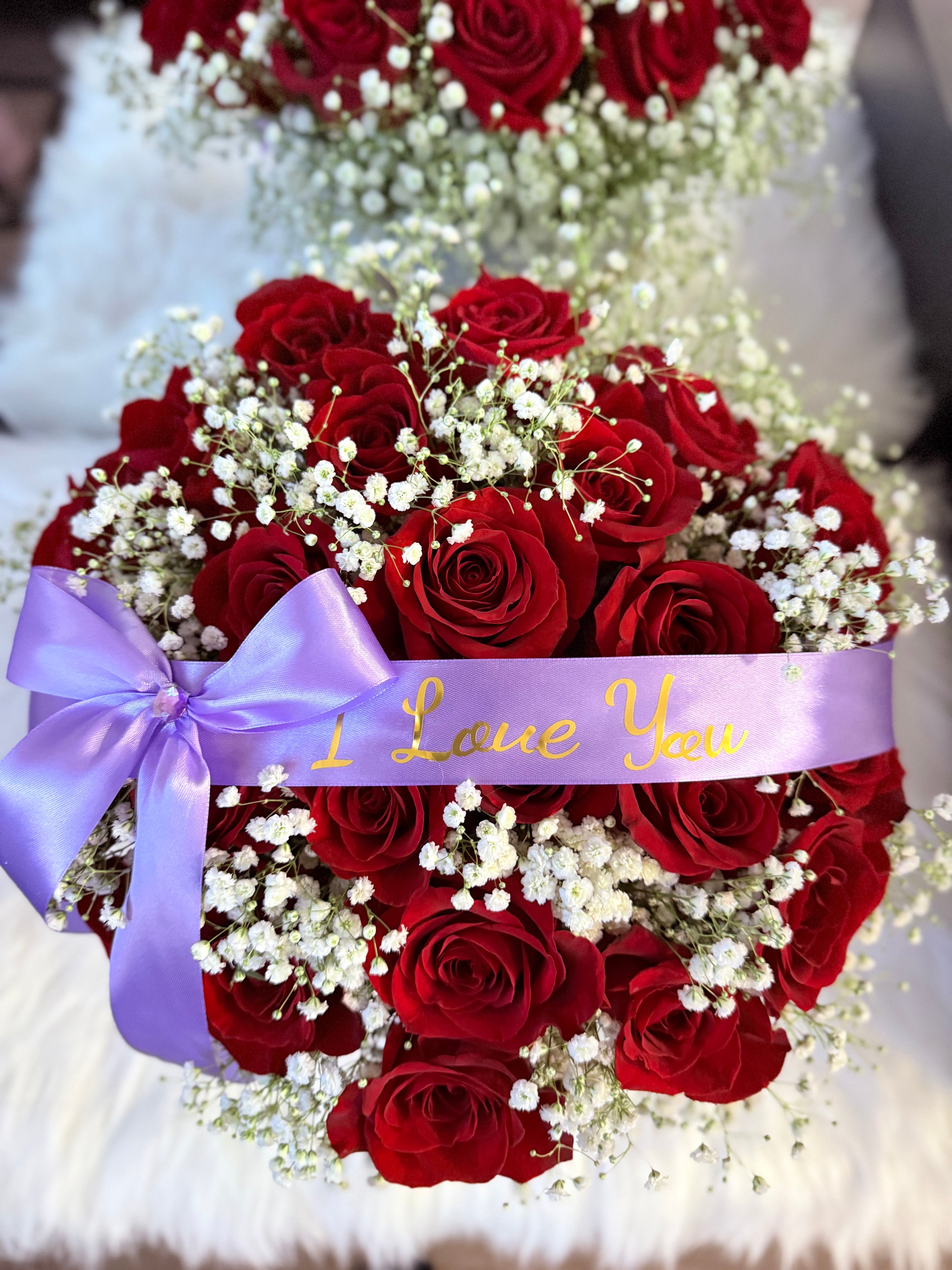 24 Red Roses With baby’s breath in a Basket