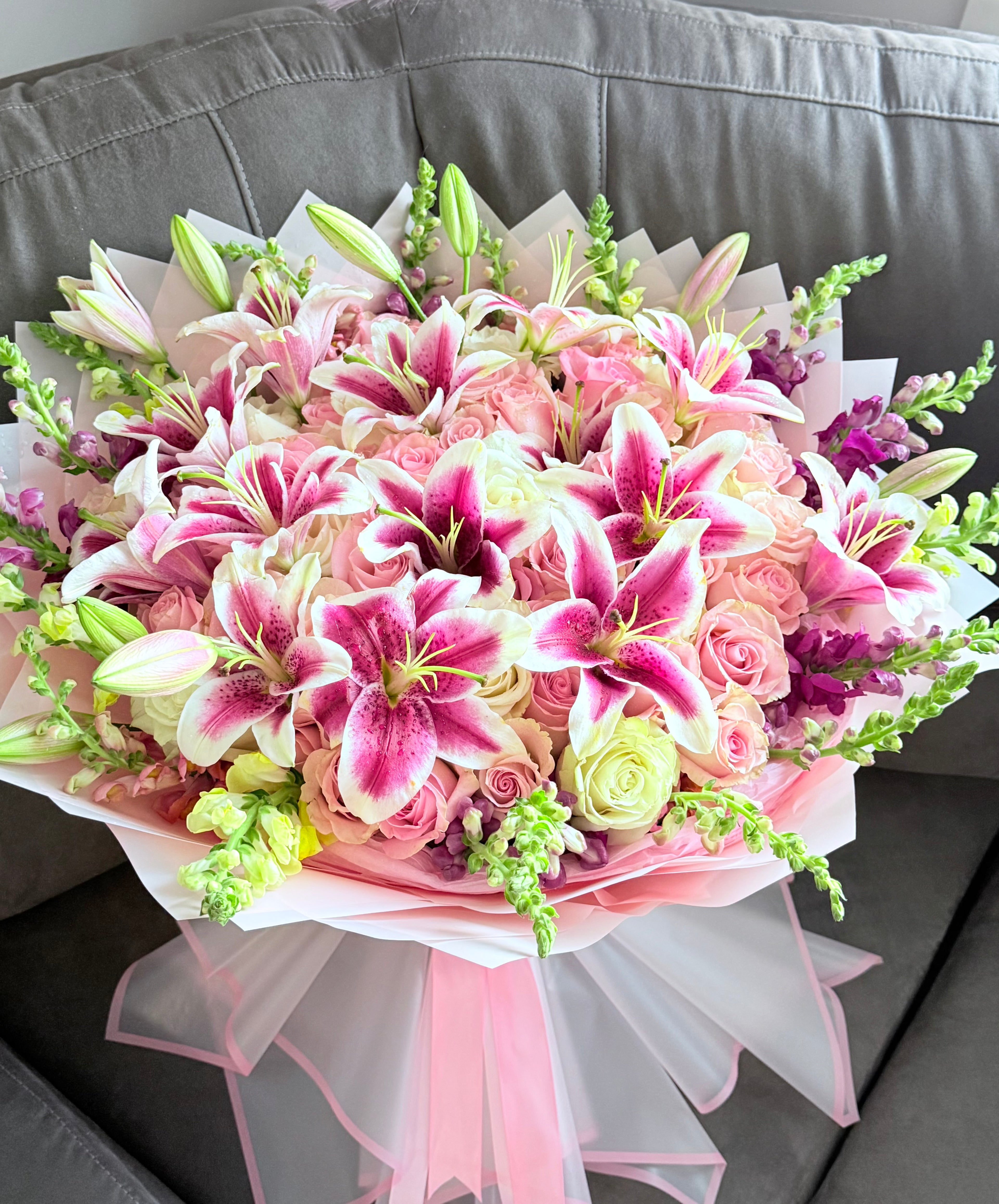 50 Roses, 12 Lilies, & Snapdragons Romantic Bouquet