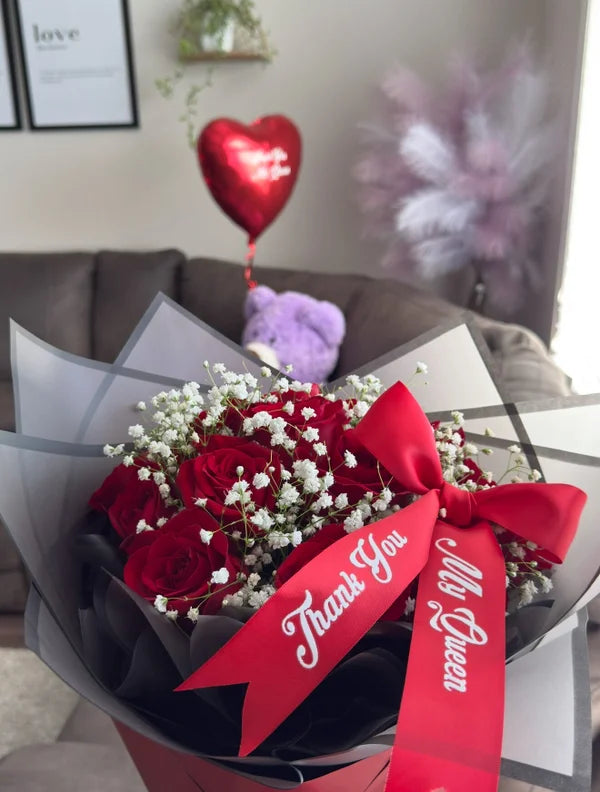 12 Red Roses with White baby’s breath Bouquet