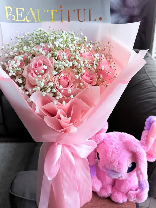 12 Pink Roses with baby’s breath