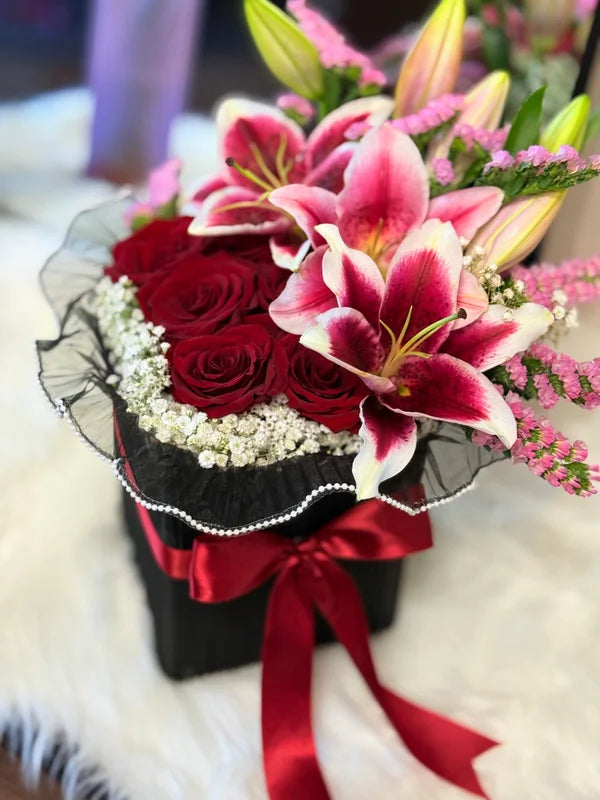 6  Premium Red Roses & Pink lilies Arrangement