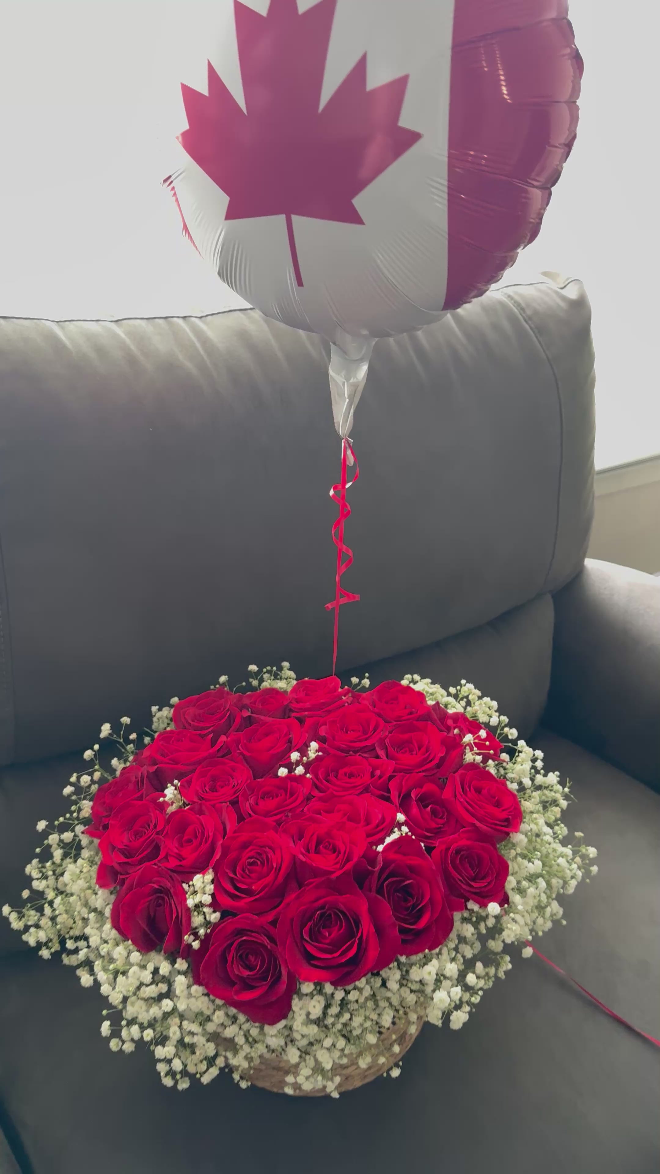 24 Red Roses With Baby’s Breath in a Basket